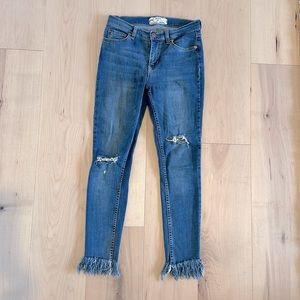 Free People mid rise distress denim jean size 25